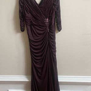 Deep Burgundy Evening Gown. Long sleeve plunging neckline. Scalloped and fitted.
